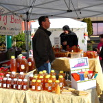 Photo of people shopping at a farmers market