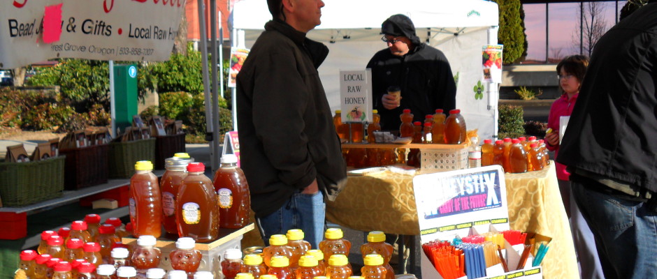 Photo of people shopping at a farmers market