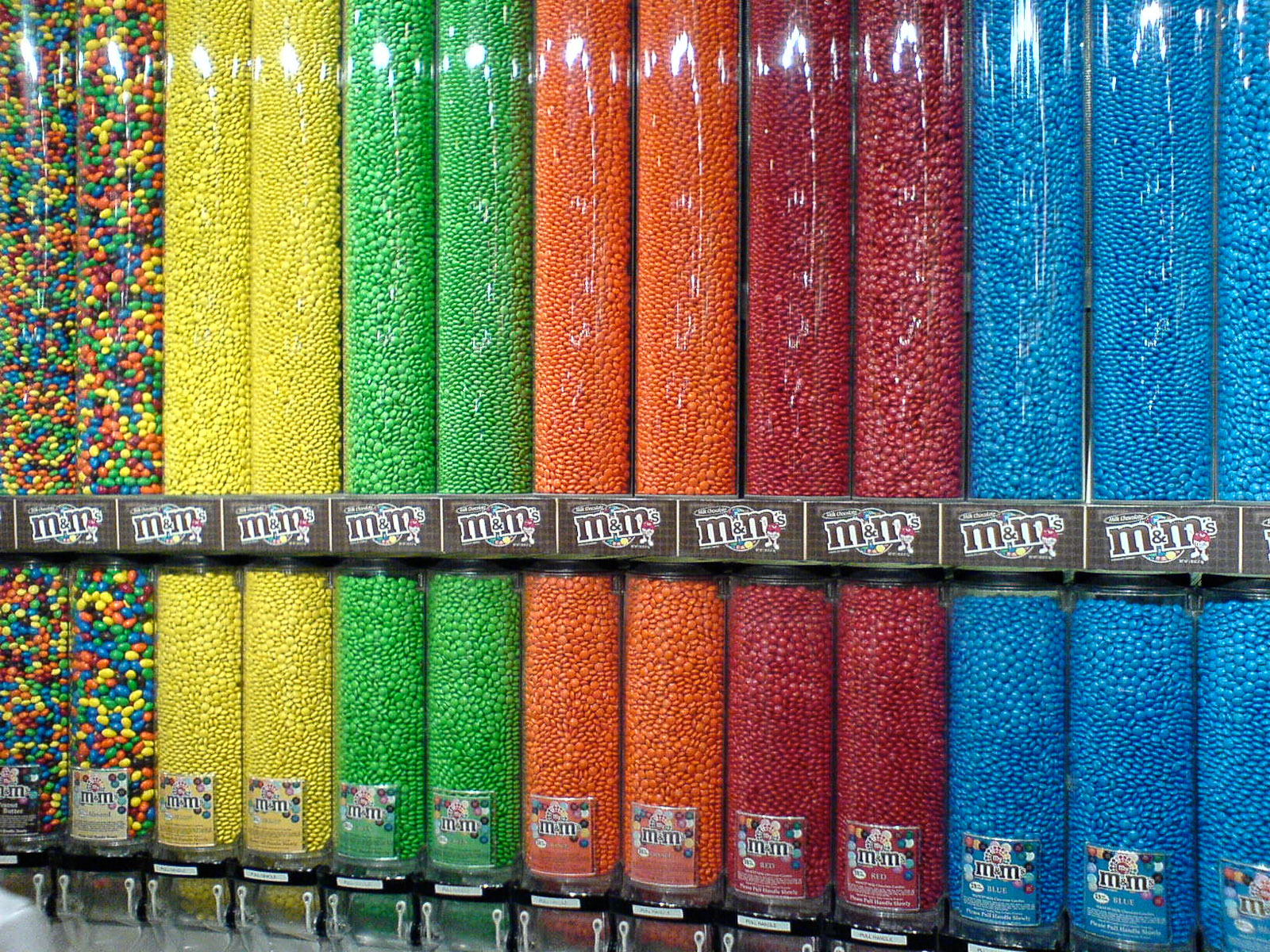 tubes filled with individual colors of M&Ms
